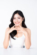 © Areerat - Portrait beautiful asian woman smiling and happy with beautiful natural makeup and glowing facial and body skin on white background. for advertising skincare and cosmetics concept.