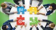 © 37Zura - Diverse Business Team Collaborating on Puzzle Pieces for Strategic Solution and Project Development