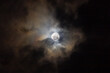 © ric - Full moon in the dark sky with clouds