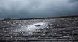 © AbstractAI - Strong and sudden hail storm affecting roofing
