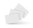 © Margarita  - Three flying plastic cards mockup vector illustration