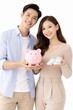 © Artcuboy - Smiling couple holding a piggy bank and baby shoes isolated on white future family savings concept