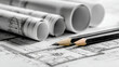 © Sergej Gerasimov - Architectural blueprints with rolled plans and sharpened black pencils on a detailed construction design drawing for building projects and planning