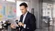 © fizkes - Virtual project management. Focused busy mid adult male business specialist work on digital pad in office manage tasks in online planning app use ai to check risks create ideas set goals for sprints