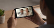 © fizkes - Happy middle aged parents talking to young adult daughter girl from her smartphone screen, waving hand hello, speaking, smiling. Mature couple taking counselling on online video call