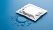 © Mdjohurul - A condom packet floating on a blue surface with water droplets around it