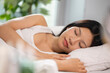 © 220 Selfmade studio - Young asian woman sleep on comfortable white bed with soft pillow during bright morning feeling peaceful relax and dream beautiful vision in cozy bedroom enjoying deep rest