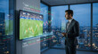 © Luiz - Data Analyst in High-Rise Office: A focused data analyst, immersed in the digital realm, studies intricate financial graphs and live sports data streaming on his monitor.