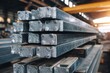 © Ольга Лукьяненко - Metal structural beams stack in warehouse interior