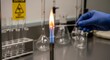 © HafizAbdullah - Bunsen burner flame heating glass rod in lab