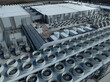 © Southport Images - Aerial close-up of an AI data center showing large-scale cooling fans, pipelines, and industrial infrastructure powering high-performance computing operations.