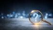 © Rosi - Magnifying glass highlighting a question mark over a digital surface representing inquiry, problem solving and analytical search for answers.