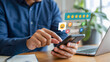 © Soyaeb - Hand of a person giving a five-star rating and positive feedback on a smartphone, illustrating excellent customer experience and online satisfaction through a digital review
