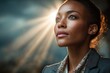 © Robert - Confident woman standing in dramatic sunlight