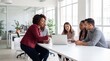 © ryker - Diverse business team collaborating around laptop in bright modern office, discussing strategy and sharing ideas with engaged expressions and open communication