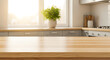 © Stock Master - Modern kitchen island with wooden countertop and green plant decoration Vector