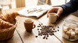 © Thai - Fresh morning breakfast scene featuring espresso coffee cup roasted dark bean buttery croissant and sweet sugar cube on a rustic cafe table promoting gourmet beverage culture and lifestyle.