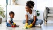 © olegganko - Mother Teaches Child to Clean in Bright Room During Daytime