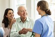 © Prazis Images - Senior Man and His Daughter Shaking Hands with a Home Care Nurse