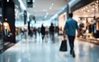 © Sahrul - Blurred Shoppers Walking in Modern Shopping Mall Interior.