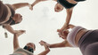 © Andrii Nekrasov - Women in Gym Circle Holding Hands During Workout