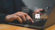 © Mah zaib Mushtaq - A person types on a laptop keyboard with floating digital feedback speech bubble icons