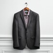 © HD Creativity - Dark suit jacket with patterned shirt on hanger.