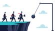 © Nur - Group of businessmen walking in a line towards a dangerous swinging wrecking ball at the edge of a cliff representing risk and business failure.