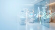 © praewpailyn - Medical background hospital corridor with heartbeat waveform and glowing line over blurred interior conveying calm modern healthcare technology. Ideal for digital health concept and patient care