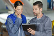 © auremar - beautiful couple working on a tablet