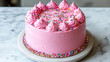 © Mianumar - Vibrant hot pink celebration cake with colorful sprinkles on marble countertop for birthday party
