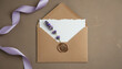 © anees - Lavender sprigs and purple ribbon frame a sealed envelope evoking. Elegant Lavender Wedding Stationery / Gift Aesthetic