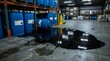 © Gophotograph - Dangerous liquid leakage from storage containers causing a mess in a factory environment.