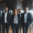 © cjsolanop - Confident professionals stride through a modern office corridor. They smile warmly, conveying teamwork and leadership. Light reflects off sleek glass walls behind them. Ideal for business meetings