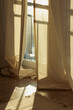 © Anastazja - Sunlight streaming through beige linen curtains in a cozy room at golden hour.