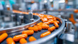 © Nataliya - Glossy orange capsules moving on a conveyor belt in a pharmaceutical or supplement manufacturing facility, automated production line concept, with copy space