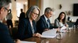 © Justlight - Detailed view of pension fund decisionmakers seated at a long table main focus on attentive face analyzing agenda pages ambient room features gently out of focus.