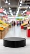 © OleksandrZastrozhnov - Black round pedestal displayed empty in supermarket interior