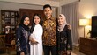 © Nur - A Happy Family Poses Together Indoors.