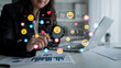 © InfiniteFlow - A business professional analyzes social media metrics while interacting with vibrant digital reactions. The image captures modern workplace dynamics and engagement trends. Ledger