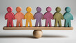 © Aillusionist - Colorful wooden human figures evenly balanced on seesaw symbolizing diversity equality inclusion fairness teamwork community harmony and social balance