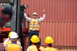© NVB Stocker - Strike of workers in container yard. Group of multiethnic engineer people during a protest in workplace