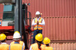 © NVB Stocker - Strike of workers in container yard. Group of multiethnic engineer people during a protest in workplace
