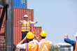 © NVB Stocker - Strike of workers in container yard. Group of multiethnic engineer people during a protest in workplace