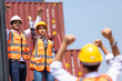 © NVB Stocker - Strike of workers in container yard. Group of multiethnic engineer people during a protest in workplace