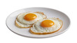 © Miguel - Two perfectly fried eggs with bright yellow yolks on a white plate, isolated on transparent background