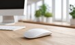 © jhx studio - Minimalist Home Office with White Computer Mouse on Wooden Desk Surface
