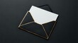 © Yuliia - Elegant black envelope with gold edges containing white blank card on dark background for luxury correspondence and invitation design.