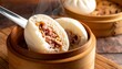 © Ferdastudio - Steamed Char Siu Bao with Fluffy Bun and Savory Pork Filling Being Pulled Apart