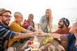© Rawpixel.com - Diverse friends enjoying beach picnic